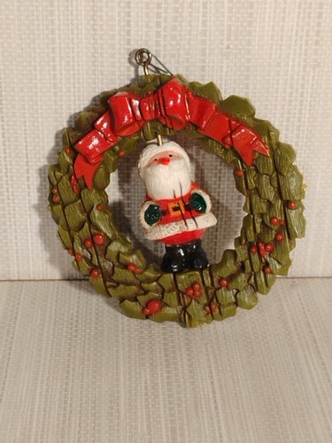 Christmas Ornament Rotating Santa in a Wreath Vintage 1977