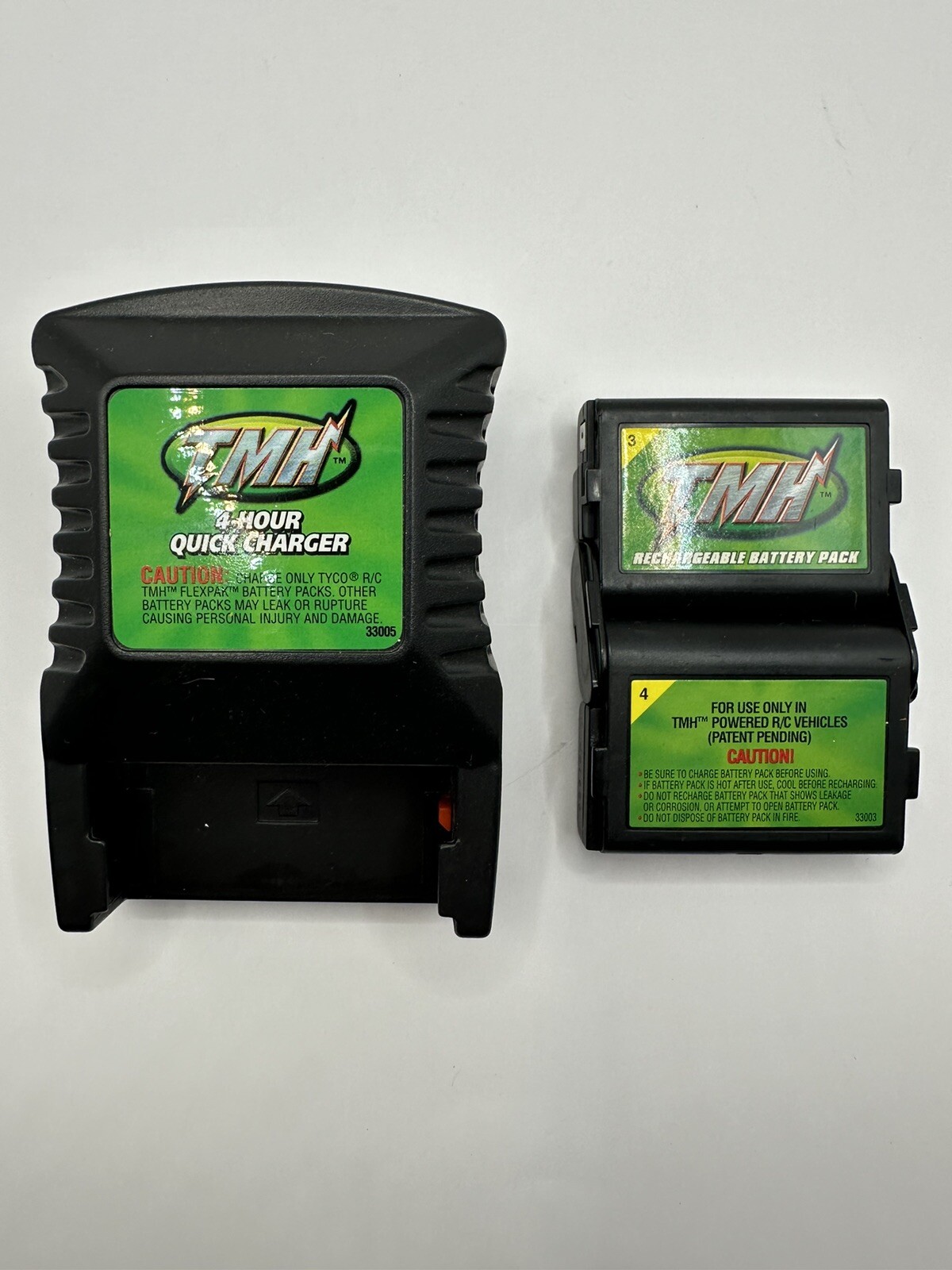 Tyco RC TMH FlexPak Battery Pack & 33005 4-Hour Quick Charger Factory & Battery