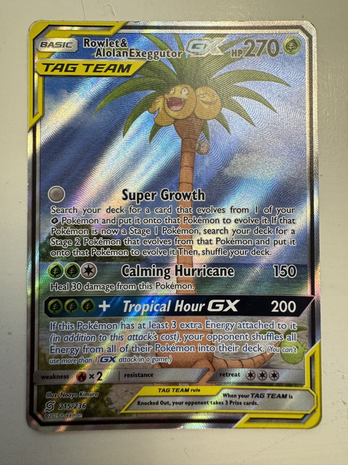 Rowlet & Alolan Exeggutor GX (Alternate Full Art) 215/236 Sm-Unified Minds Holo