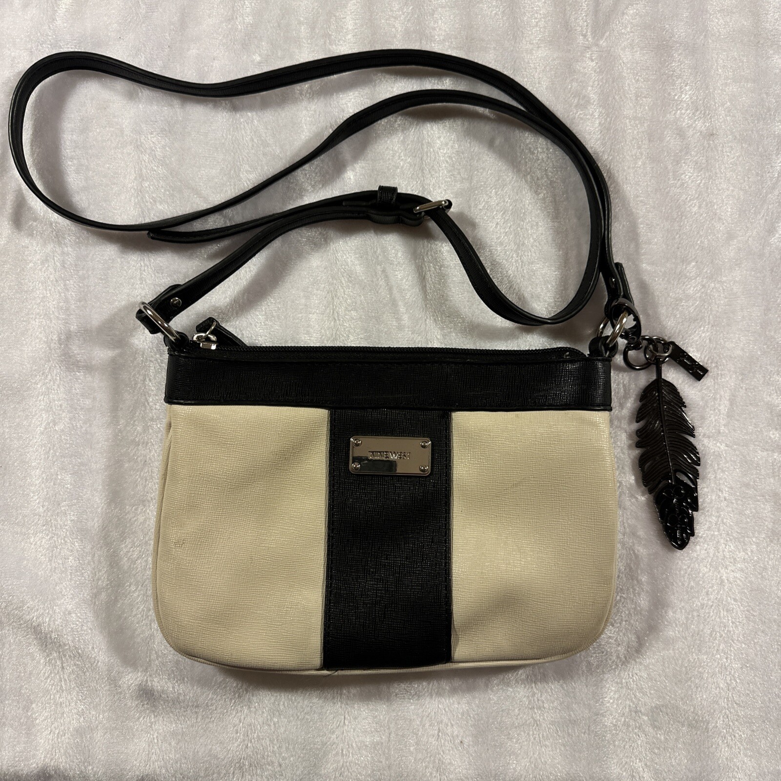 Nine West small bag, with strap, keychain metal feather white and black bag