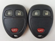 ORIGINAL LOT OF 2 GM 06-24 OEM ALARM KEY LESS ENTRY REMOTE FOB VAN USA TRUCK SUV