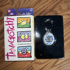 Bandai 1997 Tamagotchi Original Virtual Reality Pet NIB 1800