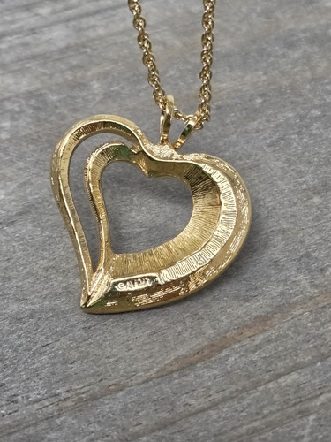 Collana con ciondolo cuore aperto strass cristallo tono oro e baguette catena 16" - Foto 4 di 13