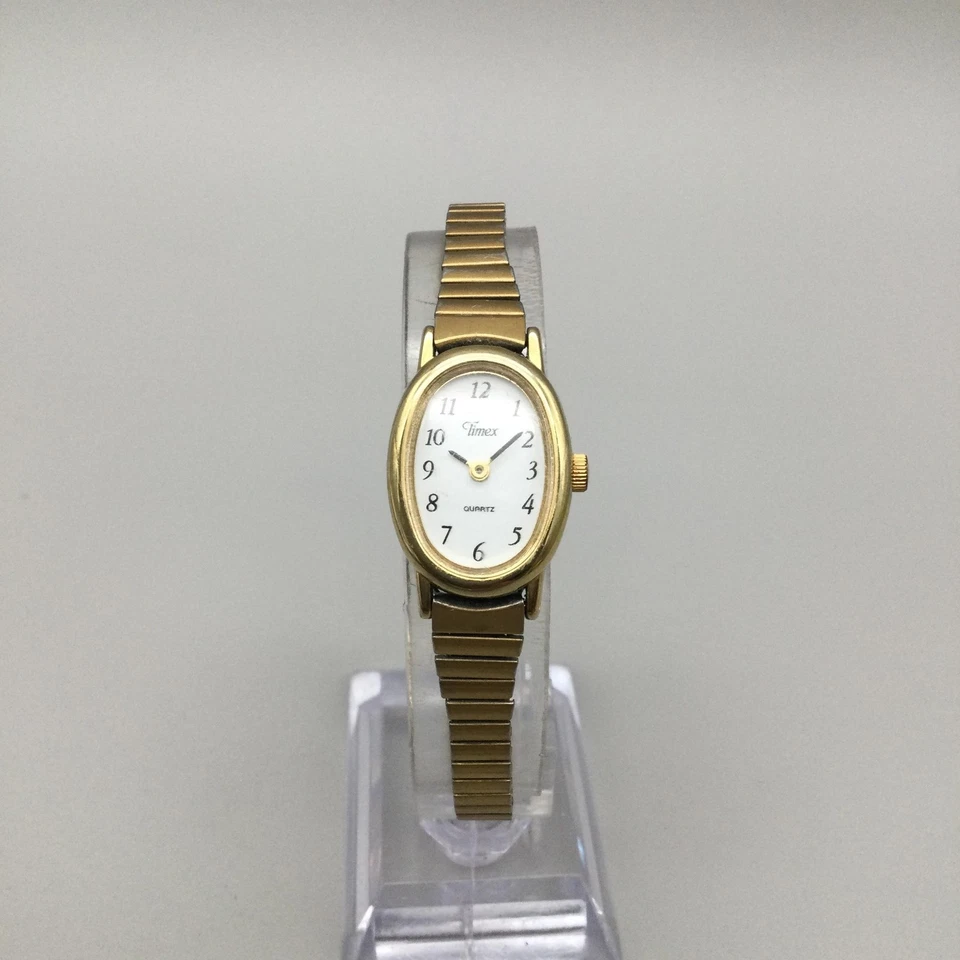 Reloj Timex Cavatina Mujer 18mm Tono Dorado Ovalado Esfera Blanca Elastizado Batería Nueva Foto 2 de 4