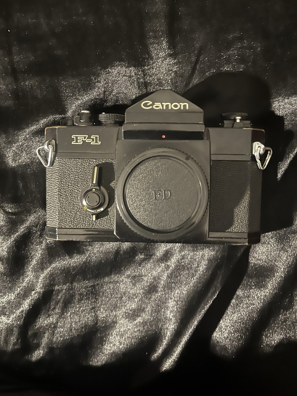 Canon F-1 Black 35mm SLR Film Camera with Canon FD 50mm f/1.8 Lens