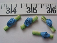 7137 Ribbon Roses Flowers Medium Blue 1x1/2 36 Pcs 7137 Ribbon Roses Flowers Medium Blue 1x1/2 36 Pcs
