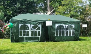 Lovely Green 3x6 metre pop up gazebo with sides and windows.