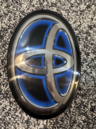 Toyota Corolla Cross Hybrid OEM 2023 Front Grille Emblem Logo Radar 90975-C2022 - Picture 3 of 6