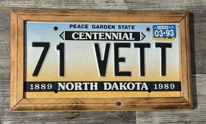 Framed 1993 North Dakota Vanity License Plate-“71 VETT” Off-1971 Chevy Corvette