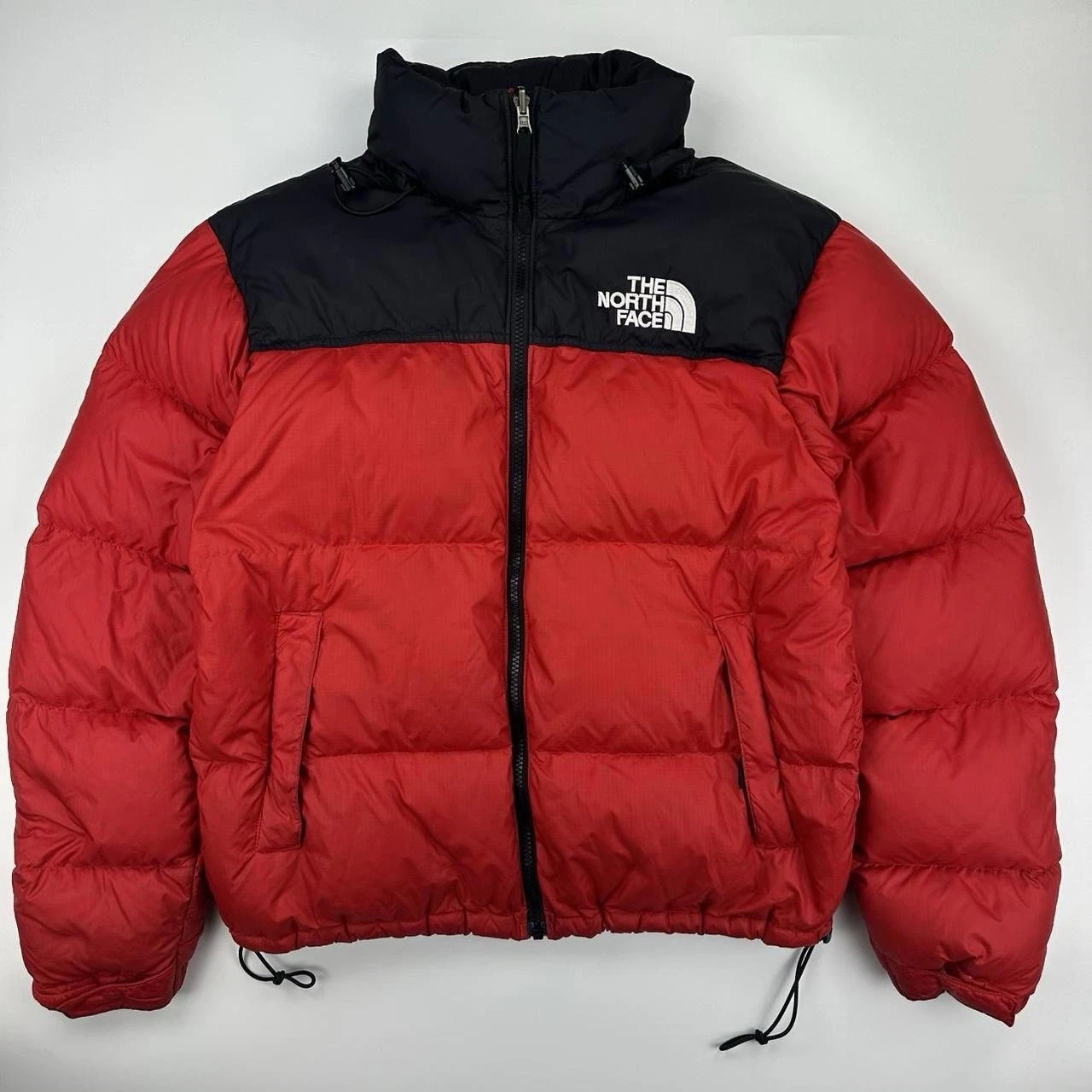 The North Face TNF 1996 Nuptse Puffer Jacket in red and black. Size Small