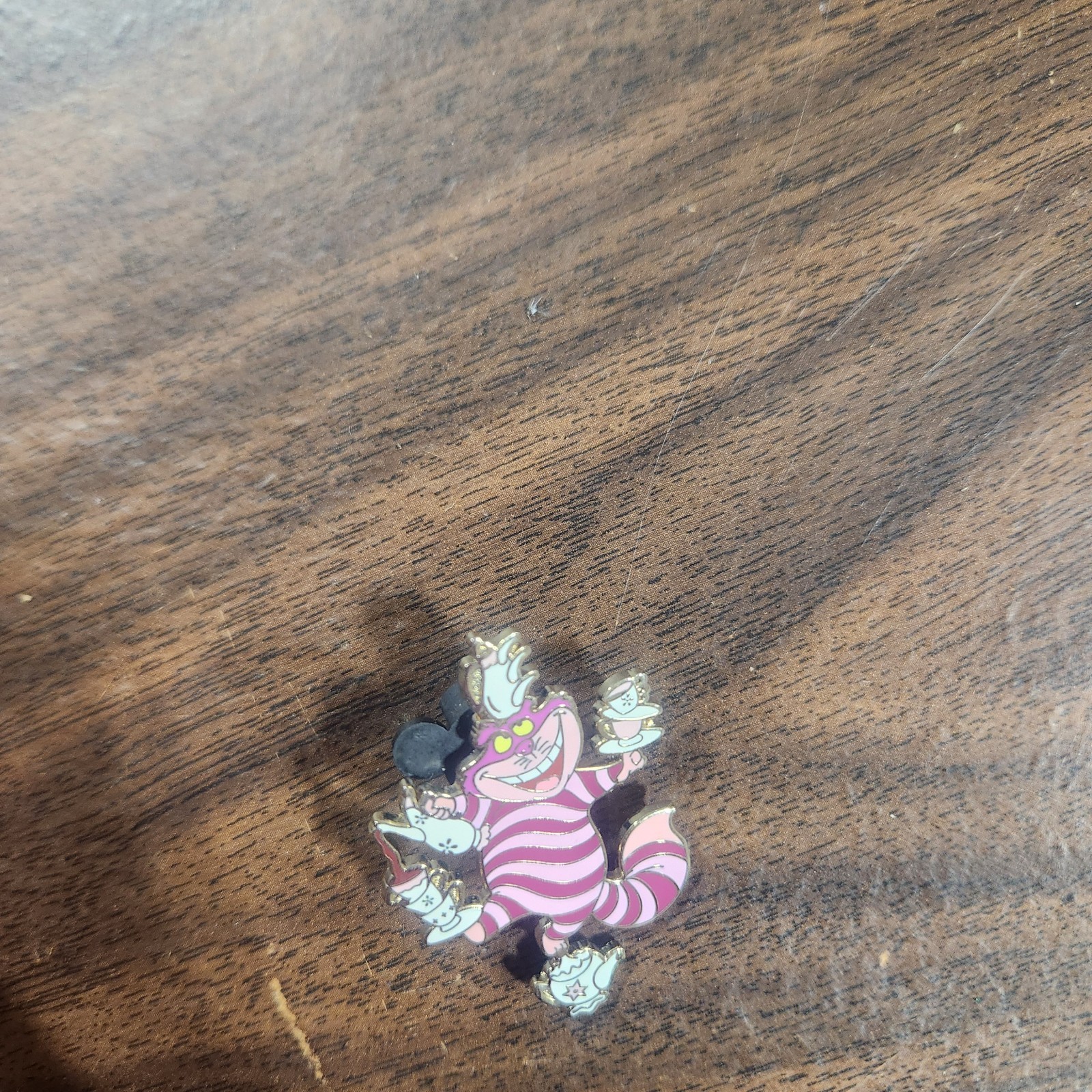 Disney's Cheshire Cat Balancing Tea Cups Trading Pin P1