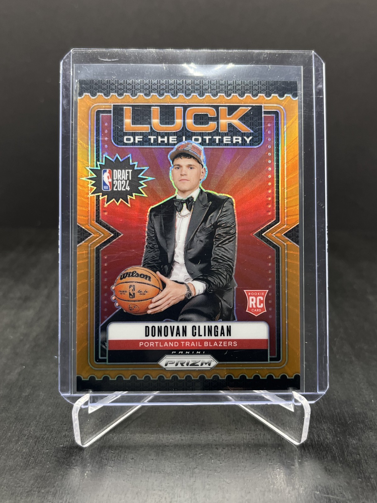 2024-25 Panini Prizm Donovan Clingan RC Luck of the Lottery Orange 36/49 #9