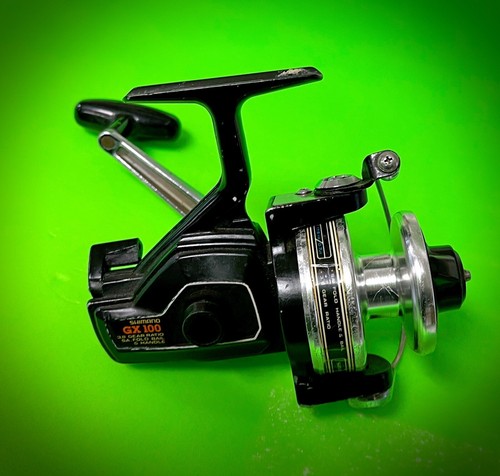 Carrete giratorio Shimano GX100 vintage bonito limpio - Imagen 4 de 7