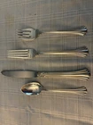 Reed and Barton 18th Century sterling silver four piece place settings