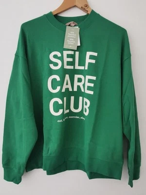 BNWT H&M Self Care Club Print Green Sweatshirt Size Large * NEW - Image 1 of 4