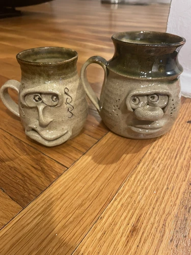 Two Vintage Ugly Face Stoneware Pottery Mugs Coffee EUC