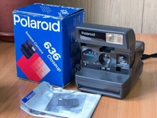 Polaroid 636 CloseUp, shoots 600 instant films - with built-in flash