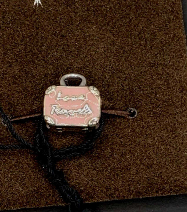 Pandora pink cheap travel bag charm