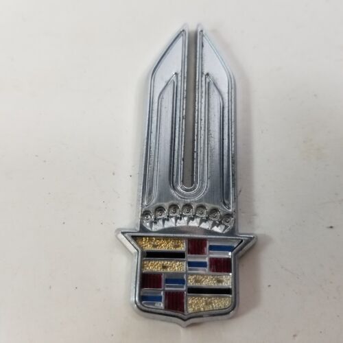 1977-1986 Cadillac Fleetwood Brougham Tail Light Emblem - P/N - 16500785