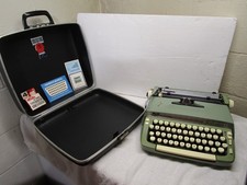 Smith Corona OASIS GREEN Super Sterling Portable Typewriter with Case Excellent thumbnail