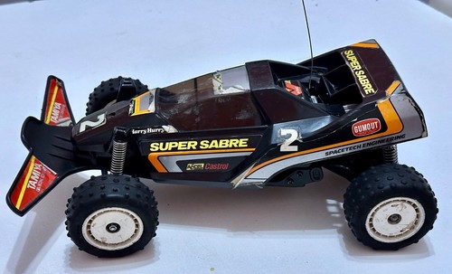 Auto radiocomandata batterie TAMIYA Quick Drive R/C Model SUPER SABRE (vintage) - Foto 10 di 17