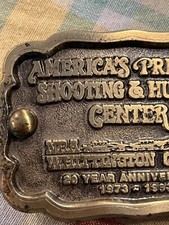 America's Premier Shooting  Hunting Center Belt Buckle 1973 1993 Heavy 20 YR