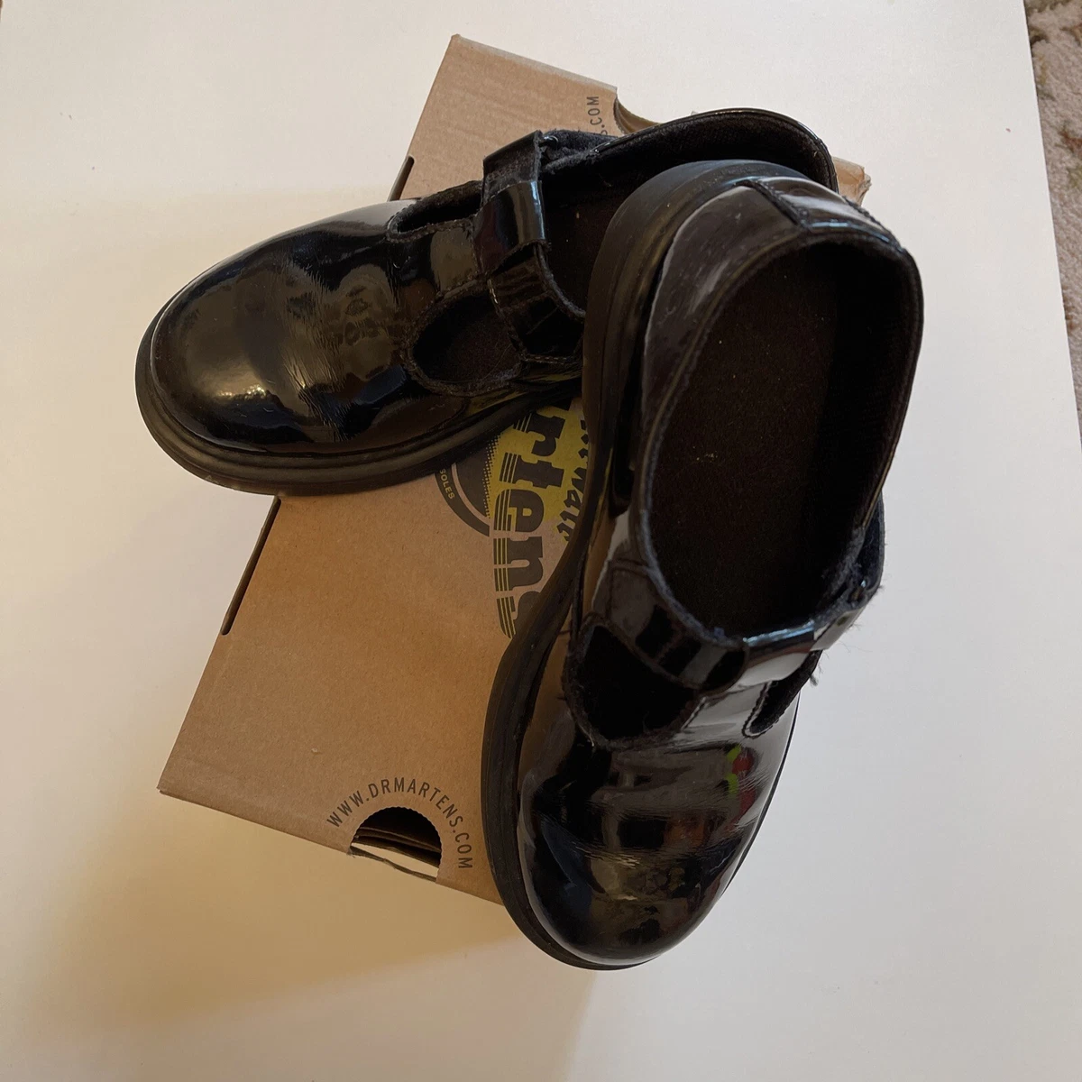 Girls black shop patent dr martens