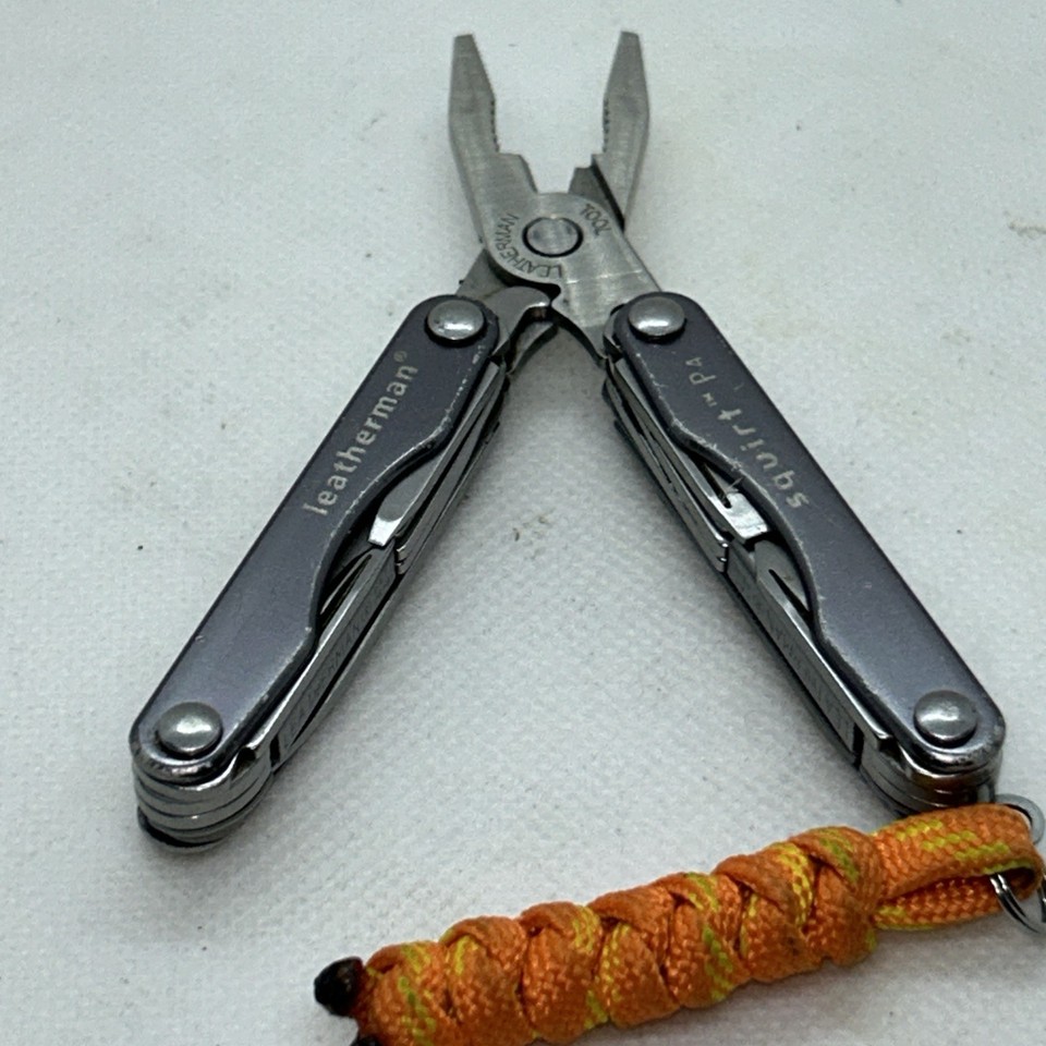 The Leatherman Squirt P4 in rare gun-metal gray is a cult-favorite micro multi-tool that slips onto a keyring — the gray colorway is genuinely hard to find and collectible.