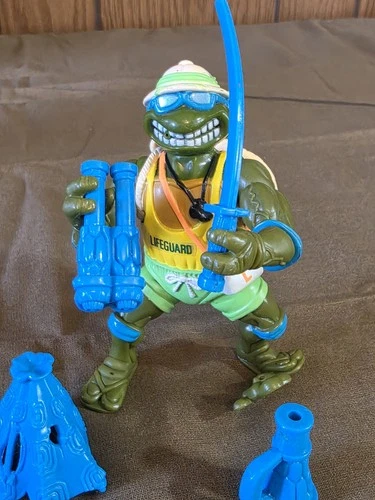 Vintage 1992 TMNT Sewer Spitting Lifeguard Leo Action Figure