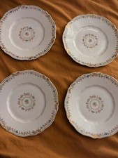 4 floral motif plates made by Theodore Haviland Limoges France