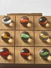 Lot Of 9 Peltier Banana Cats Eye Glass Marbles 5/8