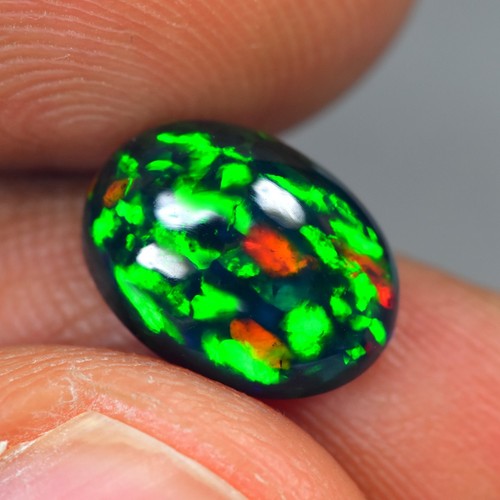 2.00Ct Oval Cab _ 3D Multi Color Playing Natural Welo Black Opal
