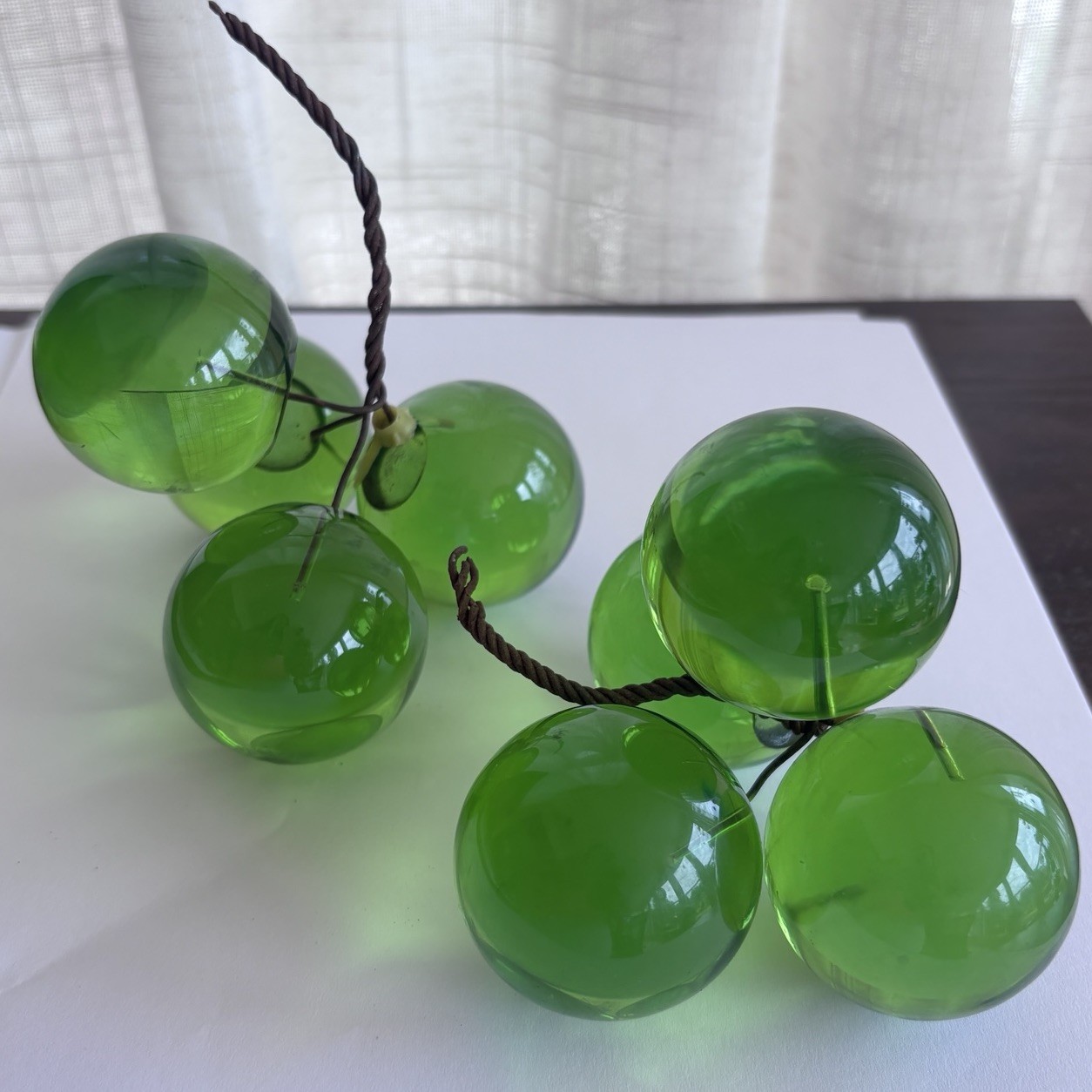 Two green lucite acrylic grape cluster sculptures, mid-century modern decor