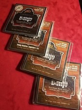 Four Sets Ghs Banjo Strings 2 Of Med. Light 2 Of Almost Medium