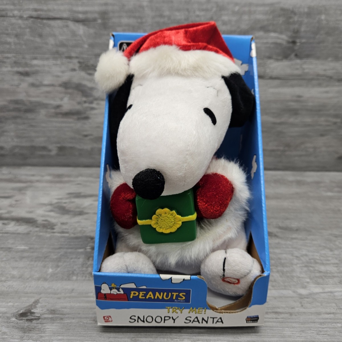 GEMMY Peanuts Snoopy With Gift Santa Plush 9