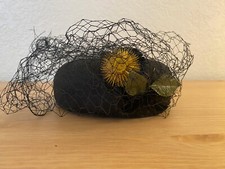 Vintage pillbox black hat with veil and floral flair