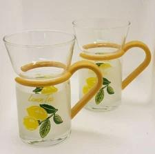 VINTAGE SET OF 2 INSPIRATION LEMON TEA GLASSES W/ YELLOW PLASTIC HANDLES Summer