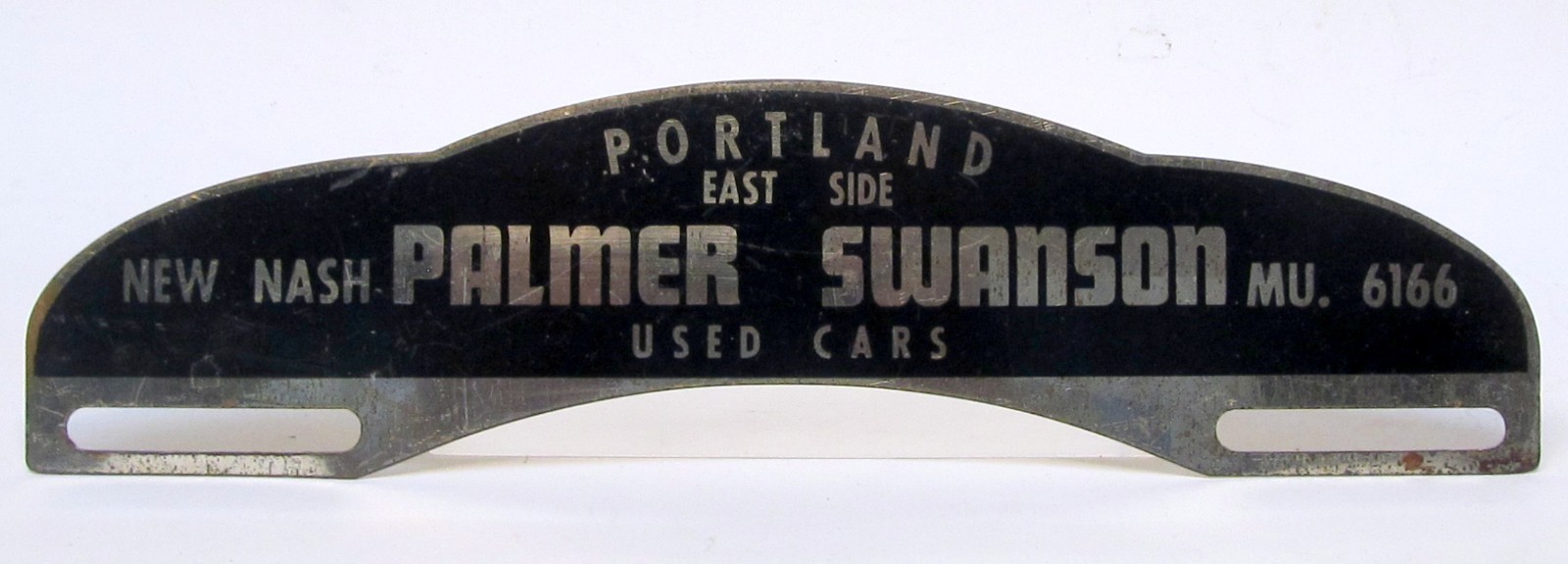 NEW NASH PALMER SWANSON USED CARS PORTLAND OR license plate topper