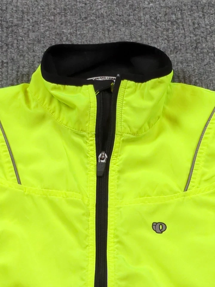 Chaqueta cortavientos Pearl Izumi para mujer pequeña amarilla reflectante cremallera completa ciclo  Foto 2 de 4
