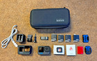 GoPro HERO 11 Black Action Camera With Batteries, Charger, and Accessories