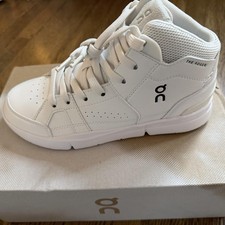 On Running Roger Clubhouse Mid white sneakers...