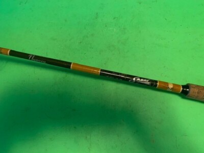 VINTAGE CHOCOLATE SABRE FOOT 10 TO 20 POUND RATED SPINNING FISHING ROD 