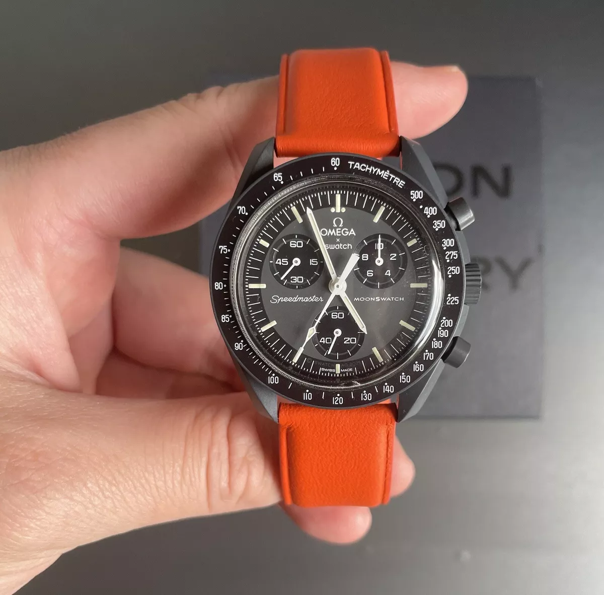 Omega with orange clearance strap
