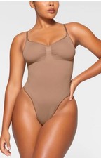 X3 Skims beige seamless sculpt thong bodysuit Color Sienna, Black And Brown