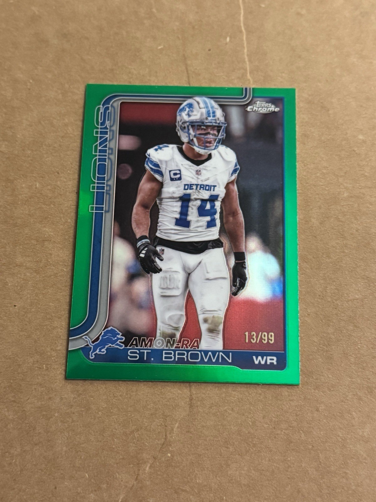 2025 Chrome Football Amon-Ra St. Brown Green /99