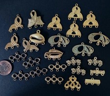 Vintage Fancy Gold Tone Metal 3 Looped Charms...
