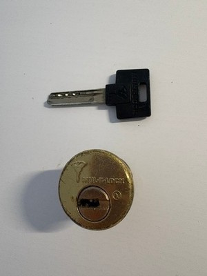MUL T LOCK cylinder with one key 1 1/8'' brass good pre-owned condition