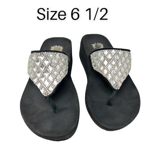 yellow box gray flip flops