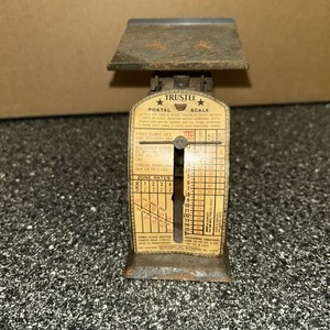 VINTAGE EASTERN METALCRAFT CO 4" HIGH TRUSTEE TIN POSTAL SCALE MADE IN THE USA!!
