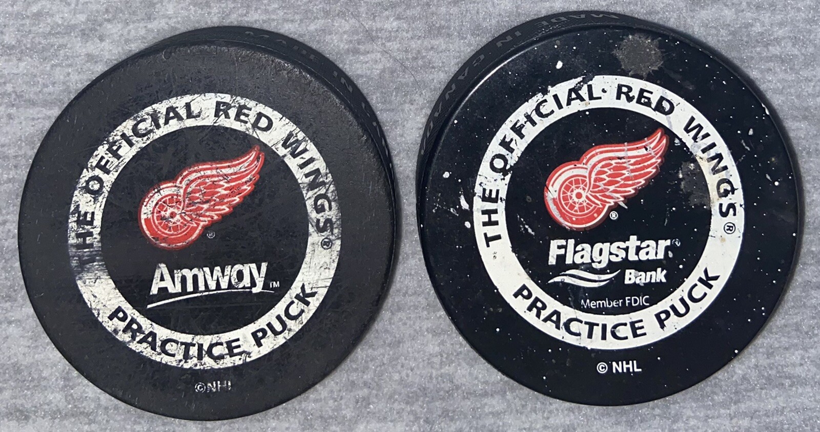 The Official Detroit Red Wings Practice Hockey Pucks Pair Of 2 NHL